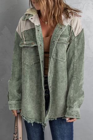 Colorblock corduroy hooded utility jacket in Sage with contrast panels and frayed hem.
