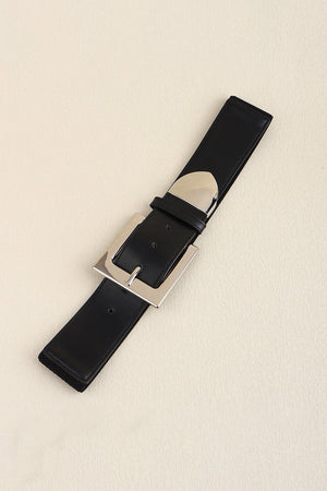 Black faux leather belt with a bold silver buckle and polished metal accents.