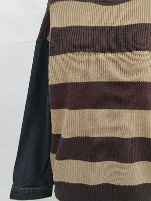 Brown and tan striped knit sweater with black denim sleeves.