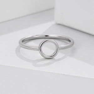 Sterling silver ring with a minimalist open circle design.