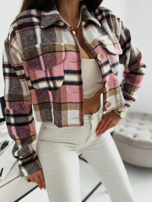 Cropped pink plaid shacket with oversized chest pockets and button front.