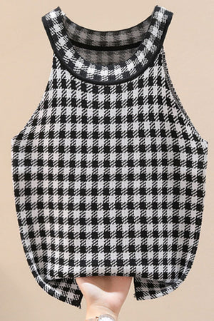 Houndstooth knit halter tank top in black and white acrylic with a scoop neckline.