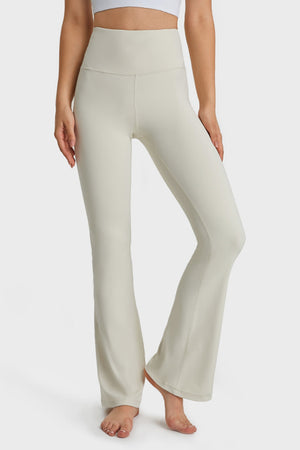FutureFlex Flare Yoga Pants in white, high-waisted, breathable, flared leg activewear.