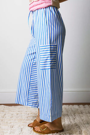 Maternity wide-leg ankle pants in blue and white stripes with pockets and drawstring waist.