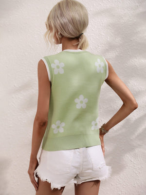 Light green knit tank top with white daisy pattern and ribbed trim.