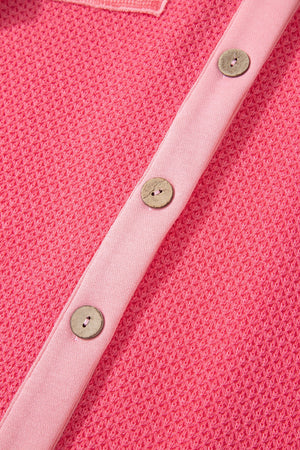 Waffle knit shacket in blush pink with button front and contrast trim.