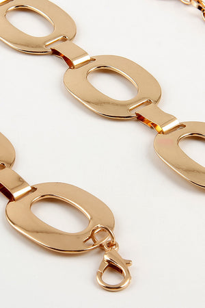 Gold oval link chain belt with lobster clasp closure