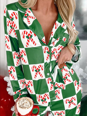 Green checkered pajama set with candy cane print, buttoned top and pockets.