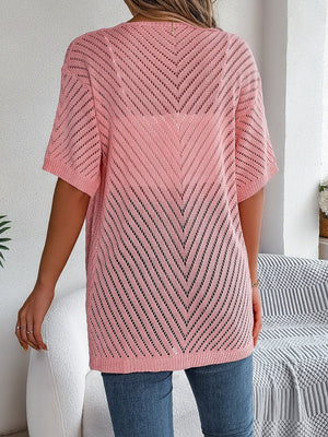 Pink open-knit slouchy cardigan with short sleeves and chevron pattern