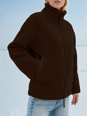Brown sherpa stand-collar jacket with zip closure and front pockets.