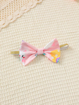Pink baby headband with bunny and star print bow