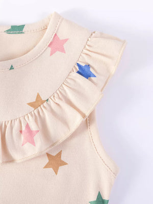 Beige cotton toddler dress with colorful star print and ruffled neckline.