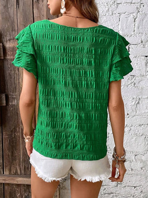 Green textured smocked blouse with ruffle sleeves
