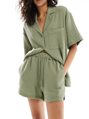 Army green crinkle cotton buttoned pajama set with shorts and short sleeves.