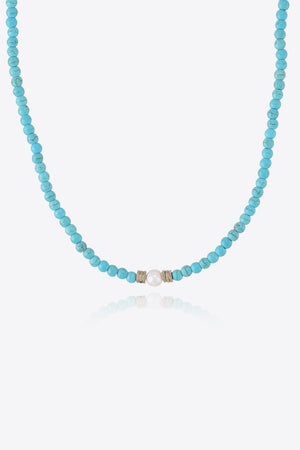 Turquoise bead necklace with pearl and silver accent beads