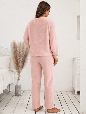 Plush raglan sleeve lounge set in watermelon pink, featuring a crew neck top and straight leg pants.