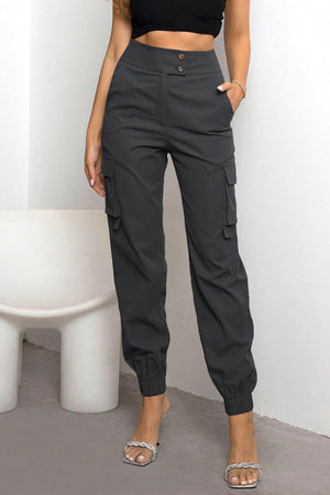Charcoal utility jogger trousers with cargo pockets and cuffed ankles.