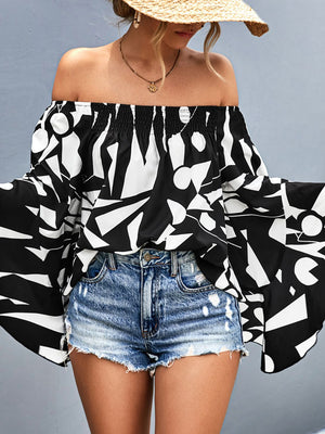 Black and white geometric print off-shoulder blouse with flared sleeves