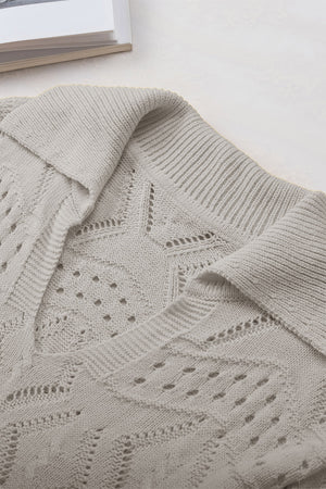 Gray openwork collar knit sweater with intricate stitch patterns and a relaxed fit.