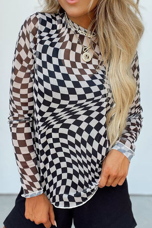 Optical Illusion Checkered Mesh Top in black and white with long sleeves and a crew neck.