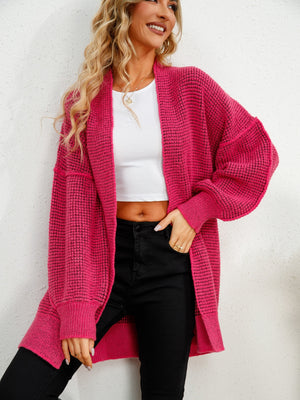 Hot Pink textured cocoon cardigan with open front and long sleeves.