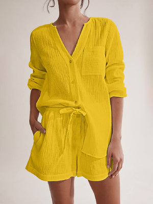 Yellow textured cotton pajama set with button-up top and drawstring shorts