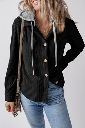 Black corduroy shirt jacket with contrast gray hood and button front.