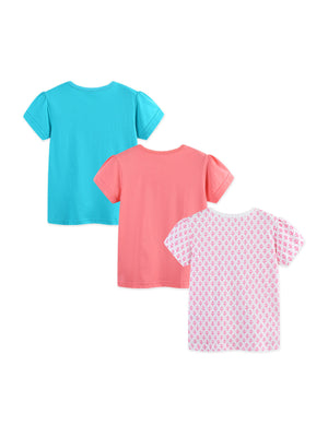 Three baby girls' cotton t-shirts: one turquoise, one coral, and one white with pink leaf pattern.