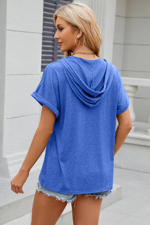 Blue hooded t-shirt with rolled short sleeves and a casual fit.