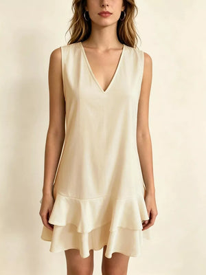 Tiered ruffle mini dress in Lotus Color with V-neck and sleeveless design.