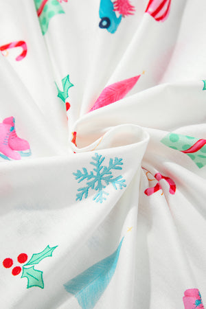 White pajama fabric with festive Christmas print including snowflakes, ice skates, candy canes, and holly.