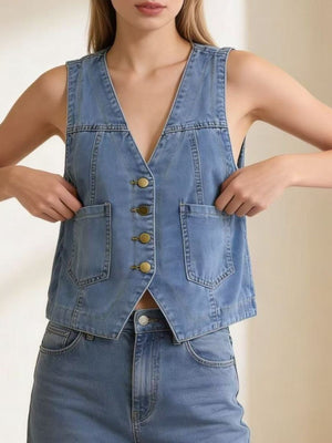 Light blue denim button-down vest with brass buttons and cropped length