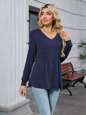 Navy blue V-neck long sleeve maternity t-shirt with subtle pintuck detail on the bodice.