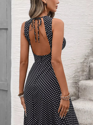 Black polka dot maxi dress with open back and tie detail