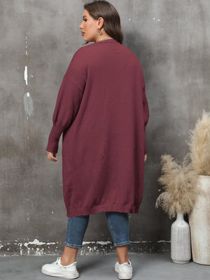 Burgundy oversized knit duster cardigan with patch pockets and ribbed cuffs.