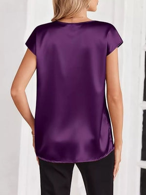 Purple satin V-neck maternity shirt with short sleeves, a relaxed fit, and a smooth finish.