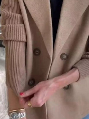 Double-breasted wool blend blazer in brown, a chic women's outerwear piece.