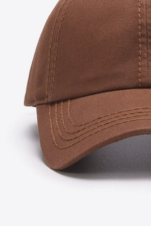 Brown canvas baseball cap with stitched details
