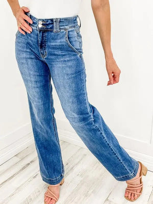 Medium wash denim wide leg jeans with utility pockets and a high waist.