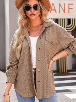 Textured oversized button-down shacket in Camel with button details and chest pockets.