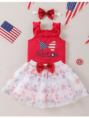 Red ruffled tank top with patriotic bow and star print tulle skirt set.