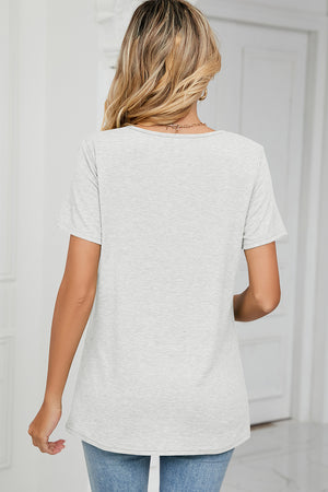 Light grey jersey tee with V-neck and short sleeves, ruched detail visible on front.