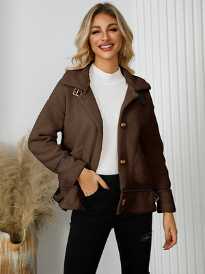 Chocolate teddy-textured jacket with leatherette trim and buckle details.