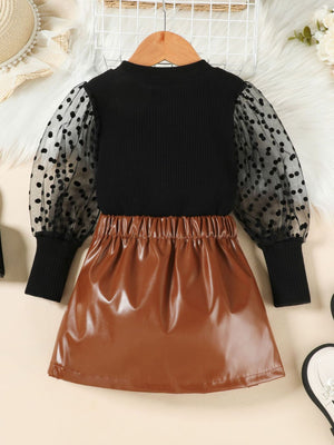 Black polka dot sleeve top and faux leather skirt set for toddlers.
