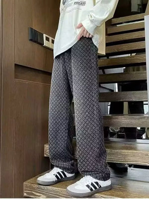 Black geometric print relaxed wide-leg jeans with a casual, chic style.