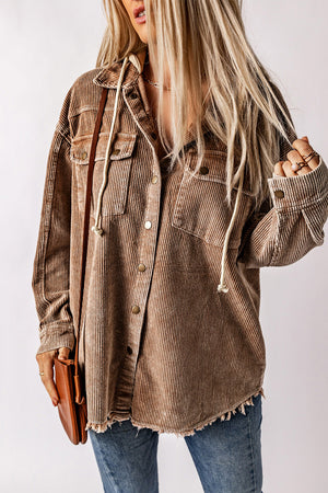 Tan corduroy hooded utility jacket with frayed hem and chest pockets.