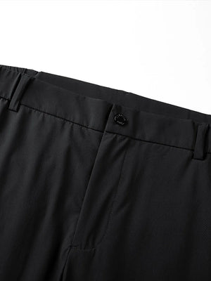 Black relaxed fit men's sweatpants with button closure and belt loops.