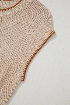 Howdy Textured Knit Sweater Vest in beige acrylic with contrast trim and a ribbed neckline.