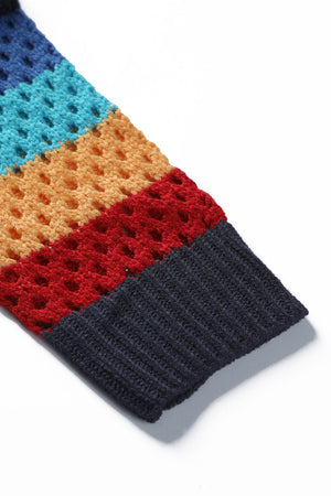 Rainbow crochet bolero with open knit and ribbed navy cuff.