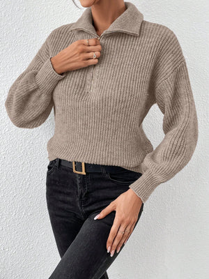 Taupe ribbed collar zip-up knit sweater with balloon sleeves.